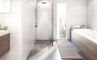 The Purusline Living Linear Wetroom Drain installed into a wetroom with a Tile Insert Grate