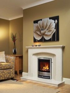 A Be Modern Octavia surround in Manila micro marble featuring a Titanium inset gas fire in Cast trim with chrome finish