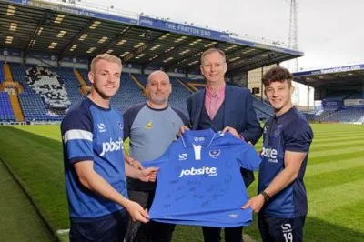 The signed shirt will be auctioned off to raise money for the Teenage Cancer Trust through the Portsmouth branch of City Plumbing Supplies. The signed shirt will be auctioned off to raise money for the Teenage Cancer Trust through the Portsmouth branch of City Plumbing Supplies.