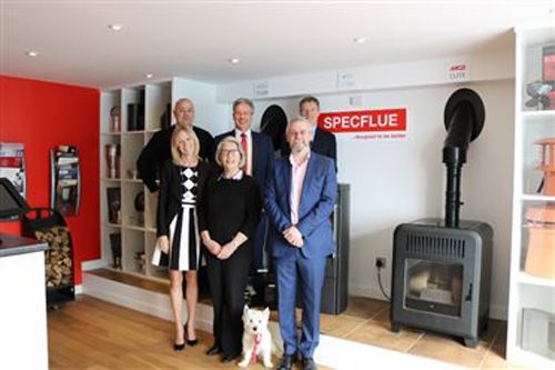 Back row: Lee George, operations manager, Ian Sams, commercial director, Richard Hall-Roberts, finance director. Front row: Jan Fry, managing director, Jeremy Fry, chairman, Shirley Williams, director, and Dave the dog