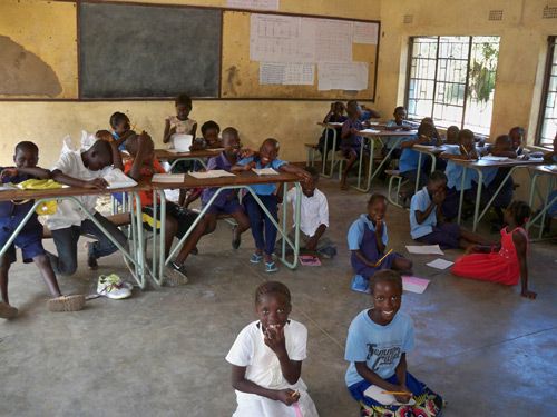 A typical classroom in this part of Zambia – too few desks, not enough of anything to help the children learn