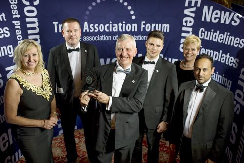 Jon celebrates the award with other members of the BMF team
