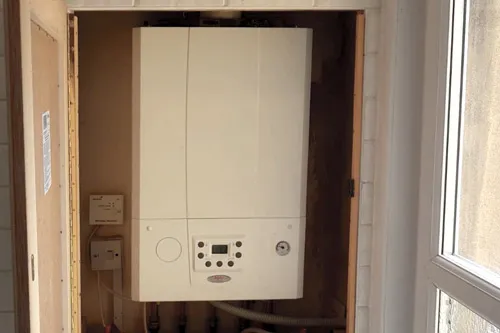 The installed E-Tec combi boiler. The installed E-Tec combi boiler.