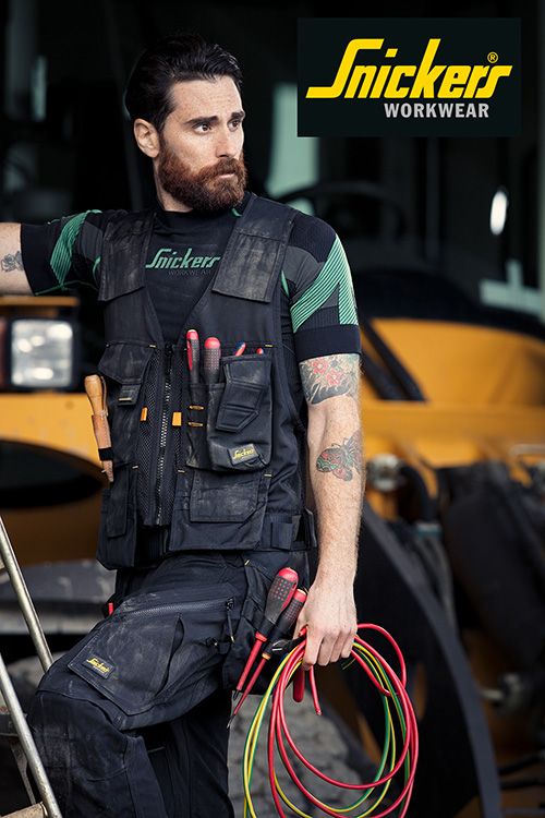 The tool vest features many hand-wearing pockets for a variety of tools and accessories