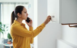 Woman calling a boiler breakdown service