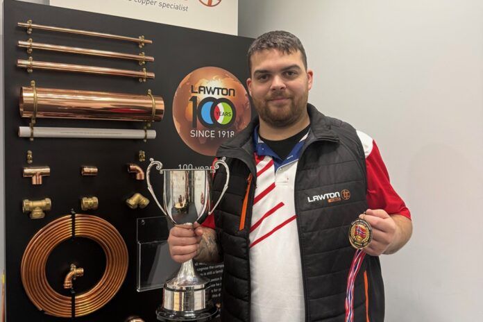Nathan Caine with winner's medal and trophy Lawton Tubes